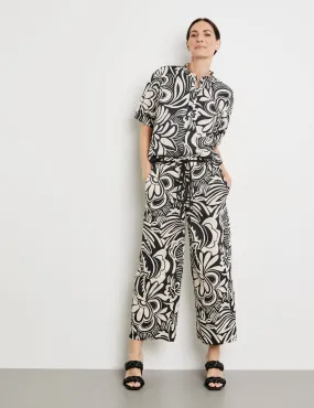 Patterned trousers with a cord tie